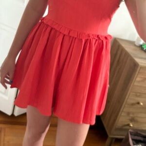 Red Jumpsuit with Flowy Silhouette and Pleated Design